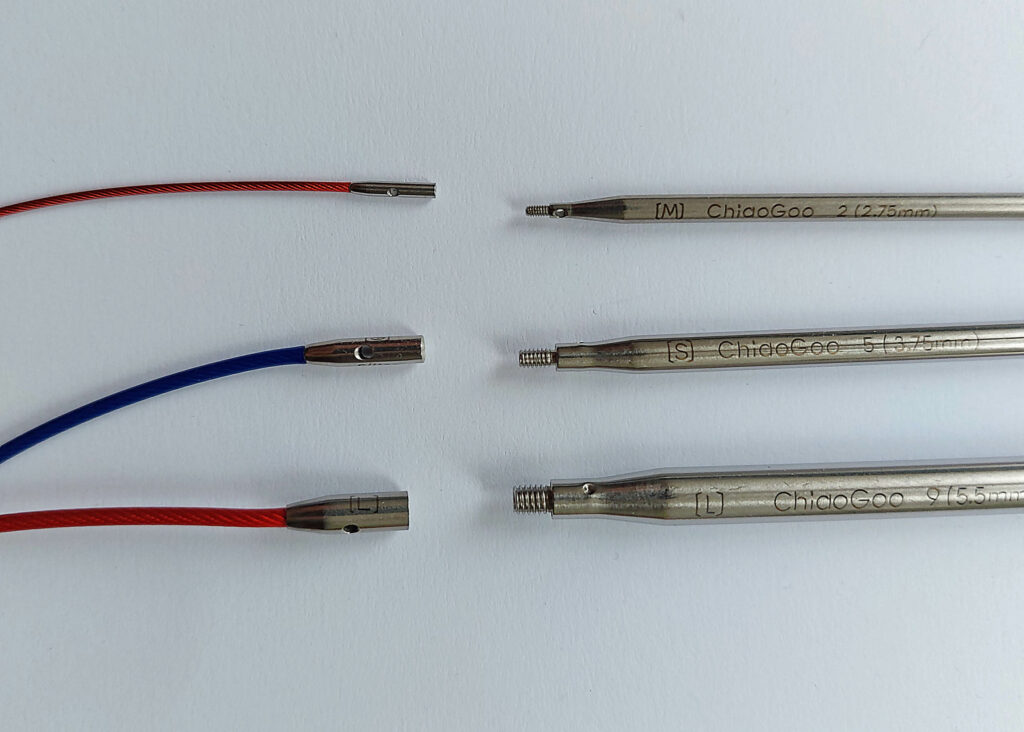 comparison photo of the mini, small and large Chiaogoo cables and needles